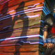 Two heroes hide from a shadowy figure.